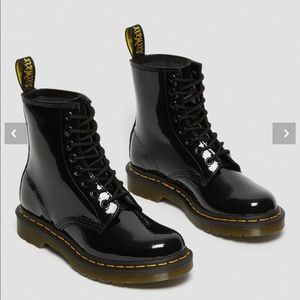 Women’s Dr. Marten’s 1460 black patent leather lace up boots. Size 7. Like new.
